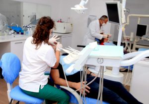 Dental team treating patients at Saranda Dental Center